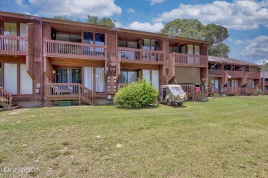 Furnished ready for a new occupant - upper level efficiency on Diamondhead Country Club in Mississippi - for sale on GolfHomes.com, golf home, golf lot