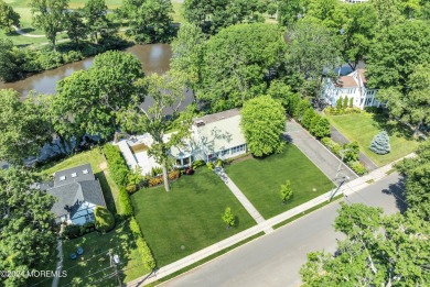 Luxury meets tranquility in this captivating waterfront property on Deal Golf and Country Club in New Jersey - for sale on GolfHomes.com, golf home, golf lot