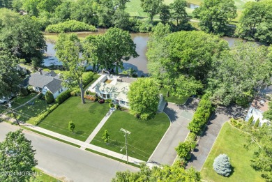 Luxury meets tranquility in this captivating waterfront property on Deal Golf and Country Club in New Jersey - for sale on GolfHomes.com, golf home, golf lot