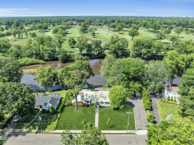 Luxury meets tranquility in this captivating waterfront property on Deal Golf and Country Club in New Jersey - for sale on GolfHomes.com, golf home, golf lot