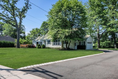 Luxury meets tranquility in this captivating waterfront property on Deal Golf and Country Club in New Jersey - for sale on GolfHomes.com, golf home, golf lot