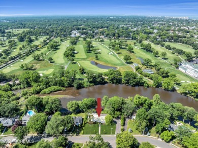 Luxury meets tranquility in this captivating waterfront property on Deal Golf and Country Club in New Jersey - for sale on GolfHomes.com, golf home, golf lot