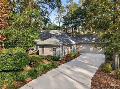 Tucked away on a private cul-de-sac surrounded by mature trees on Haile Plantation Golf and Country Club in Florida - for sale on GolfHomes.com, golf home, golf lot