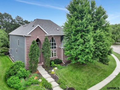 This custom Manzitto home is a jewel of the Pine Lake community! on Pine Lake Golf and Tennis Club in Nebraska - for sale on GolfHomes.com, golf home, golf lot