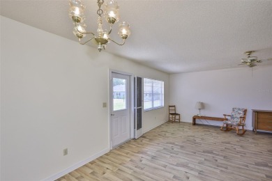 ENJOY LIFE UNDER THE SUN! Whether you're looking for a part-time on Kings Point Executive Golf Course in Florida - for sale on GolfHomes.com, golf home, golf lot