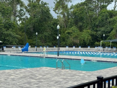 Charming 3BR/2BA End Unit Home in a Prime Location! This on Golf Club At Fleming Island in Florida - for sale on GolfHomes.com, golf home, golf lot