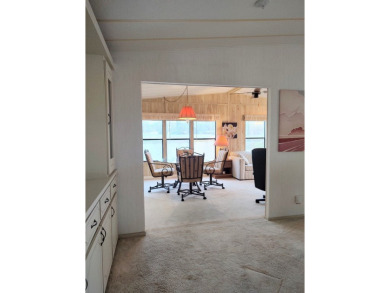Spacious two-bedroom, two-bath home located in the gated golf on Lake Fairways Country Club in Florida - for sale on GolfHomes.com, golf home, golf lot