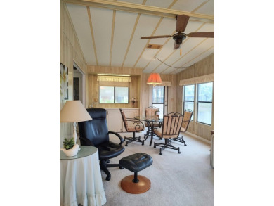 Spacious two-bedroom, two-bath home located in the gated golf on Lake Fairways Country Club in Florida - for sale on GolfHomes.com, golf home, golf lot