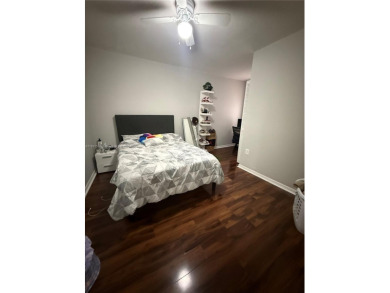 This property is a two-story unit with 3 bed 2.5 bath located in on Country Club of Miami in Florida - for sale on GolfHomes.com, golf home, golf lot