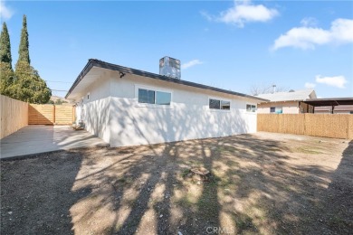 This stunning 3-bedroom, 2-bathroom home in West Banning offers on Sun Lakes Country Club in California - for sale on GolfHomes.com, golf home, golf lot