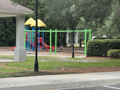 Charming 3BR/2BA End Unit Home in a Prime Location! This on Golf Club At Fleming Island in Florida - for sale on GolfHomes.com, golf home, golf lot