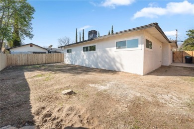 This stunning 3-bedroom, 2-bathroom home in West Banning offers on Sun Lakes Country Club in California - for sale on GolfHomes.com, golf home, golf lot