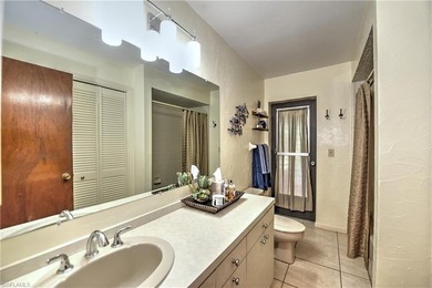 Discover the epitome of Southwest Florida living in this on Cypress Lake Country Club in Florida - for sale on GolfHomes.com, golf home, golf lot