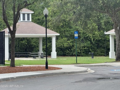Charming 3BR/2BA End Unit Home in a Prime Location! This on Golf Club At Fleming Island in Florida - for sale on GolfHomes.com, golf home, golf lot
