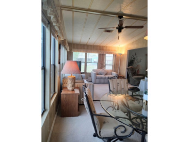Spacious two-bedroom, two-bath home located in the gated golf on Lake Fairways Country Club in Florida - for sale on GolfHomes.com, golf home, golf lot