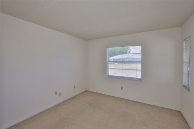 ENJOY LIFE UNDER THE SUN! Whether you're looking for a part-time on Kings Point Executive Golf Course in Florida - for sale on GolfHomes.com, golf home, golf lot