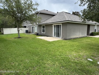 Charming 3BR/2BA End Unit Home in a Prime Location! This on Golf Club At Fleming Island in Florida - for sale on GolfHomes.com, golf home, golf lot