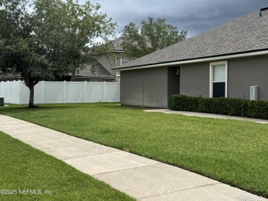 Charming 3BR/2BA End Unit Home in a Prime Location! This on Golf Club At Fleming Island in Florida - for sale on GolfHomes.com, golf home, golf lot