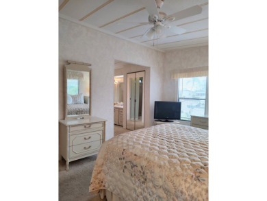 Spacious two-bedroom, two-bath home located in the gated golf on Lake Fairways Country Club in Florida - for sale on GolfHomes.com, golf home, golf lot