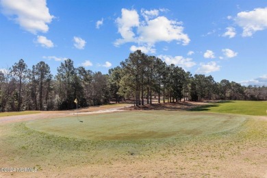 Beautifully maintained all brick ranch home nestled in the heart on Whispering Pines Golf Course in North Carolina - for sale on GolfHomes.com, golf home, golf lot