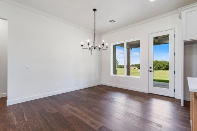 Beautifully constructed from top to bottom, 32937 Mockingbird on The Coves Golf Course in Oklahoma - for sale on GolfHomes.com, golf home, golf lot