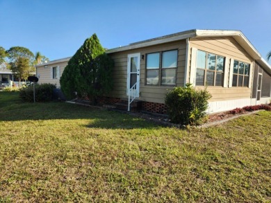 Spacious two-bedroom, two-bath home located in the gated golf on Lake Fairways Country Club in Florida - for sale on GolfHomes.com, golf home, golf lot