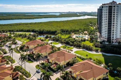 WOW! HERE IS AN AMAZING FIRST FLOOR COACH HOME WITH NUMEROUS on Hammock Bay in Florida - for sale on GolfHomes.com, golf home, golf lot