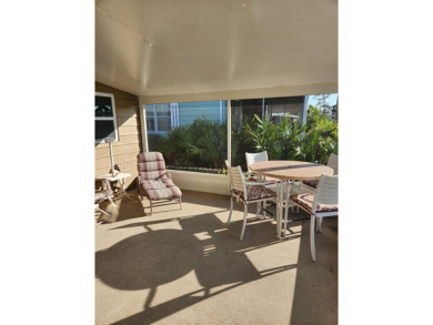 Spacious two-bedroom, two-bath home located in the gated golf on Lake Fairways Country Club in Florida - for sale on GolfHomes.com, golf home, golf lot