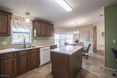OWNED LAND- NO LEASEE INVOLVED Beautiful 2 Bedroom, 2 Bath home on Pine Lakes Country Club in Florida - for sale on GolfHomes.com, golf home, golf lot