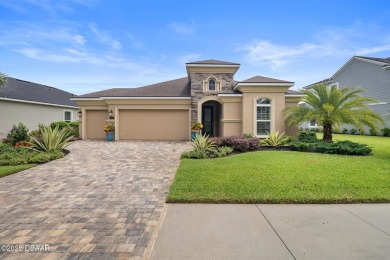 This breathtaking lakefront estate in Plantation Bay perfectly on Plantation Bay Golf and Country Club in Florida - for sale on GolfHomes.com, golf home, golf lot