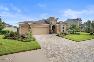This breathtaking lakefront estate in Plantation Bay perfectly on Plantation Bay Golf and Country Club in Florida - for sale on GolfHomes.com, golf home, golf lot