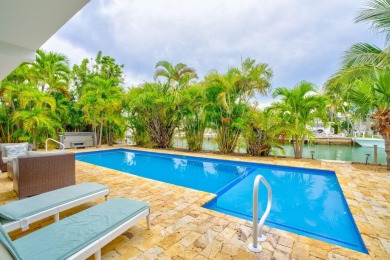 Fantastic 6 Bedroom, 4 Bath 3,248 sq. ft. waterfront pool home on Key Colony Beach Golf Course in Florida - for sale on GolfHomes.com, golf home, golf lot