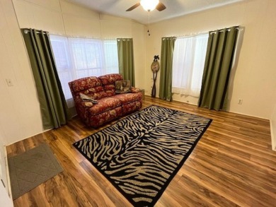 PRICE REDUCTION! Well-cared for 2-bd 2-ba home, located on a on Del Tura Golf and Country Club in Florida - for sale on GolfHomes.com, golf home, golf lot