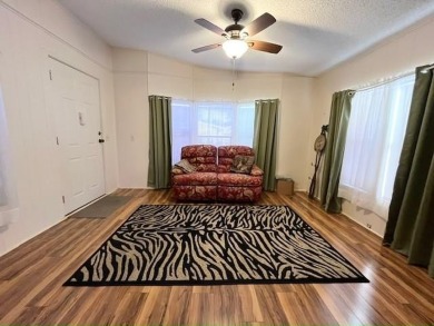 PRICE REDUCTION! Well-cared for 2-bd 2-ba home, located on a on Del Tura Golf and Country Club in Florida - for sale on GolfHomes.com, golf home, golf lot