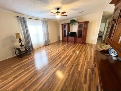 PRICE REDUCTION! Well-cared for 2-bd 2-ba home, located on a on Del Tura Golf and Country Club in Florida - for sale on GolfHomes.com, golf home, golf lot