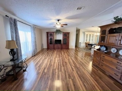 PRICE REDUCTION! Well-cared for 2-bd 2-ba home, located on a on Del Tura Golf and Country Club in Florida - for sale on GolfHomes.com, golf home, golf lot