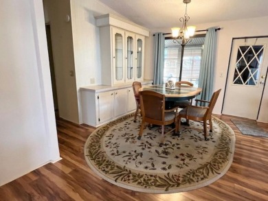PRICE REDUCTION! Well-cared for 2-bd 2-ba home, located on a on Del Tura Golf and Country Club in Florida - for sale on GolfHomes.com, golf home, golf lot