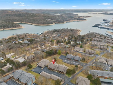 Sunrise. Sunset. Seasonal Lake Views. Low-Maintenance Living on Kimberling City Golf Club in Missouri - for sale on GolfHomes.com, golf home, golf lot