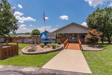 Sunrise. Sunset. Seasonal Lake Views. Low-Maintenance Living on Kimberling City Golf Club in Missouri - for sale on GolfHomes.com, golf home, golf lot