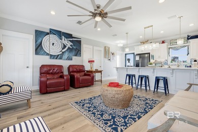 TURN-KEY coastal living with breathtaking water views from every on Isle Dauphine Club Golf Course in Alabama - for sale on GolfHomes.com, golf home, golf lot