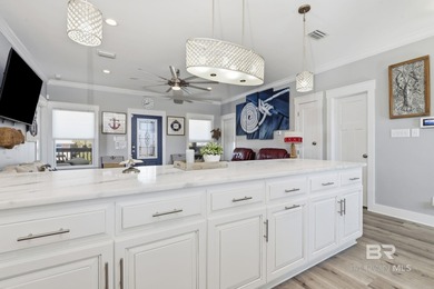 TURN-KEY coastal living with breathtaking water views from every on Isle Dauphine Club Golf Course in Alabama - for sale on GolfHomes.com, golf home, golf lot