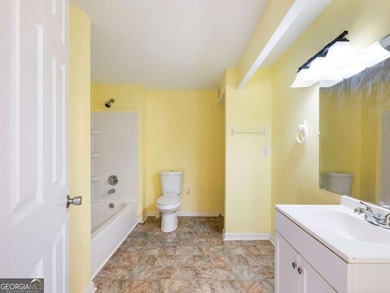 Discover cozy, low-maintenance living in this charming end-unit on Heritage Golf Links in Georgia - for sale on GolfHomes.com, golf home, golf lot