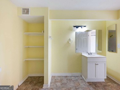 Discover cozy, low-maintenance living in this charming end-unit on Heritage Golf Links in Georgia - for sale on GolfHomes.com, golf home, golf lot