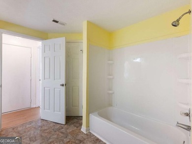 Discover cozy, low-maintenance living in this charming end-unit on Heritage Golf Links in Georgia - for sale on GolfHomes.com, golf home, golf lot