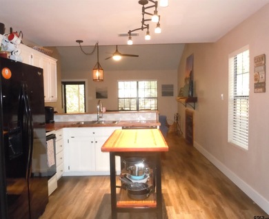 Totally and very tastefully remodeled this home is the on Holly Lake Ranch Golf Club in Texas - for sale on GolfHomes.com, golf home, golf lot