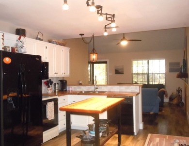Totally and very tastefully remodeled this home is the on Holly Lake Ranch Golf Club in Texas - for sale on GolfHomes.com, golf home, golf lot