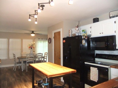 Totally and very tastefully remodeled this home is the on Holly Lake Ranch Golf Club in Texas - for sale on GolfHomes.com, golf home, golf lot