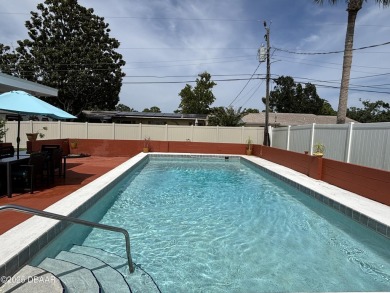 Experience Florida living with a tranquil setting in this on Daytona Beach Golf Club in Florida - for sale on GolfHomes.com, golf home, golf lot