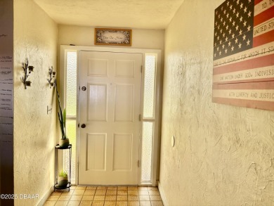 Experience Florida living with a tranquil setting in this on Daytona Beach Golf Club in Florida - for sale on GolfHomes.com, golf home, golf lot