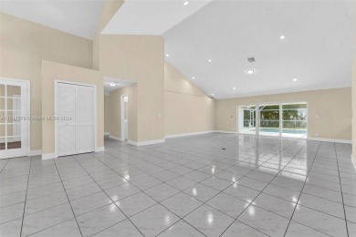 Welcome to this beautifully updated 4-bedroom, 2.5-bathroom pool on TPC Eagle Trace in Florida - for sale on GolfHomes.com, golf home, golf lot